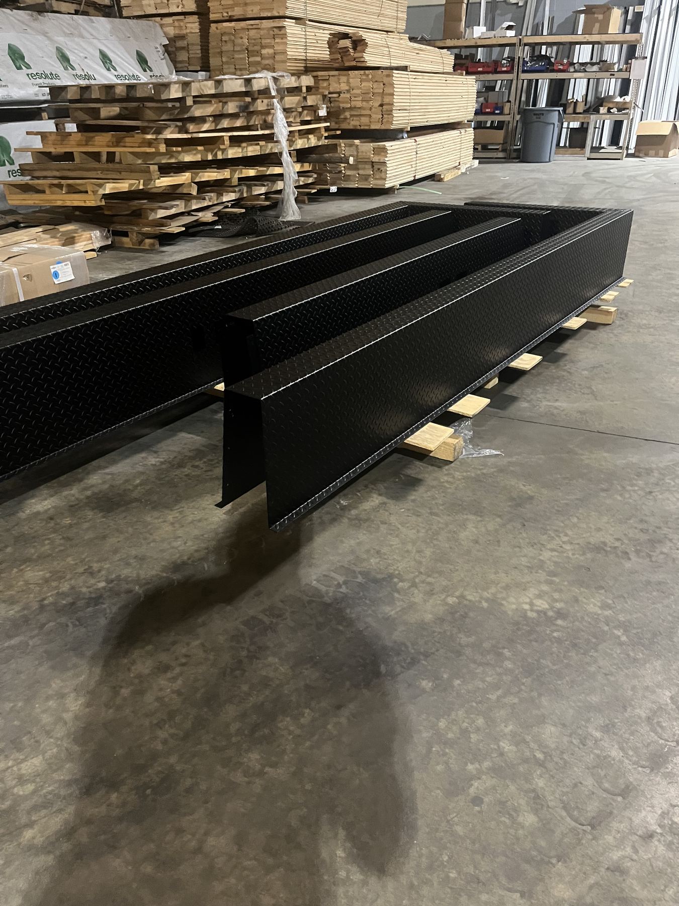Diamond-plate deck panels racked and ready to ship